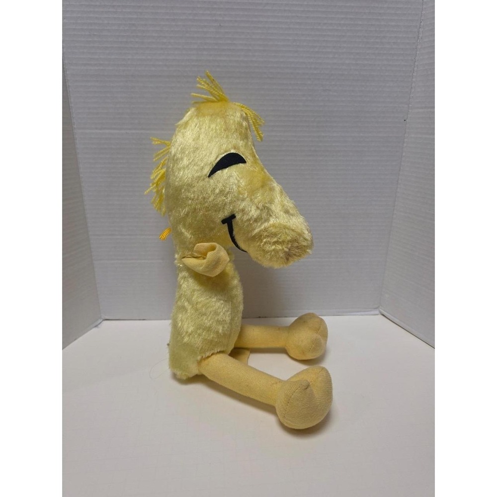 Large vintage Woodstock plush from the Peanuts series seated